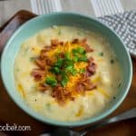 Warm up with a bowl of this delicious Creamy Baked Potato Soup. No chopping or peeling of potatoes required! Just a little prep for a delicious dinner!