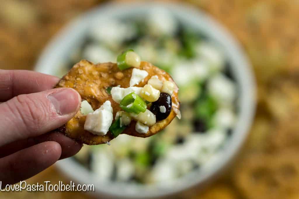 Football season is in full gear and hosting can be stressful. Take some of the stress out with this simple Black Bean Salsa and cute Football Themed Snack Pails for your next party!
