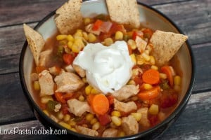 Loaded with vegetables and flavor this Chicken Tortilla Soup is the perfect warm meal!- Love, Pasta and a Tool Belt | recipes | food | soup recipes | chicken recipe | comfort food |