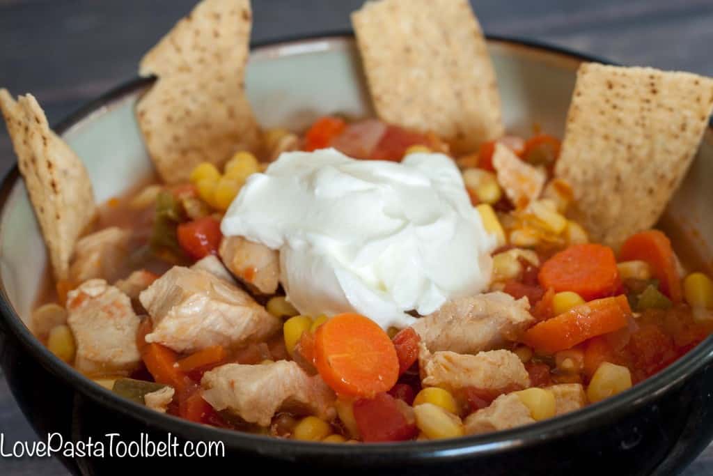 Loaded with vegetables and flavor this Chicken Tortilla Soup is the perfect warm meal!- Love, Pasta and a Tool Belt | recipes | food | soup recipes | chicken recipe | comfort food | 
