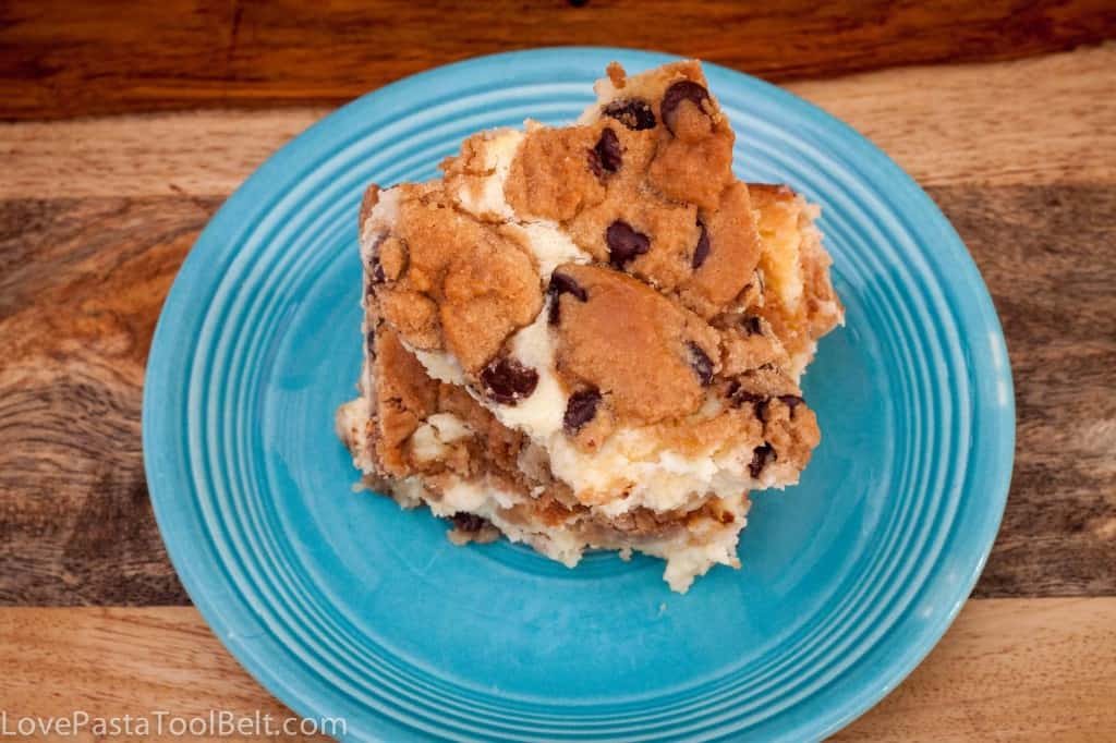 This Chocolate Chip Cookie Cake is filled with a delicious cream cheese mixture. It is easy to make and the perfect dessert- Love, Pasta and a Tool Belt