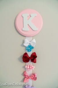 Create a cute and functional way to display your little girl's bows with this DIY Bow Holder