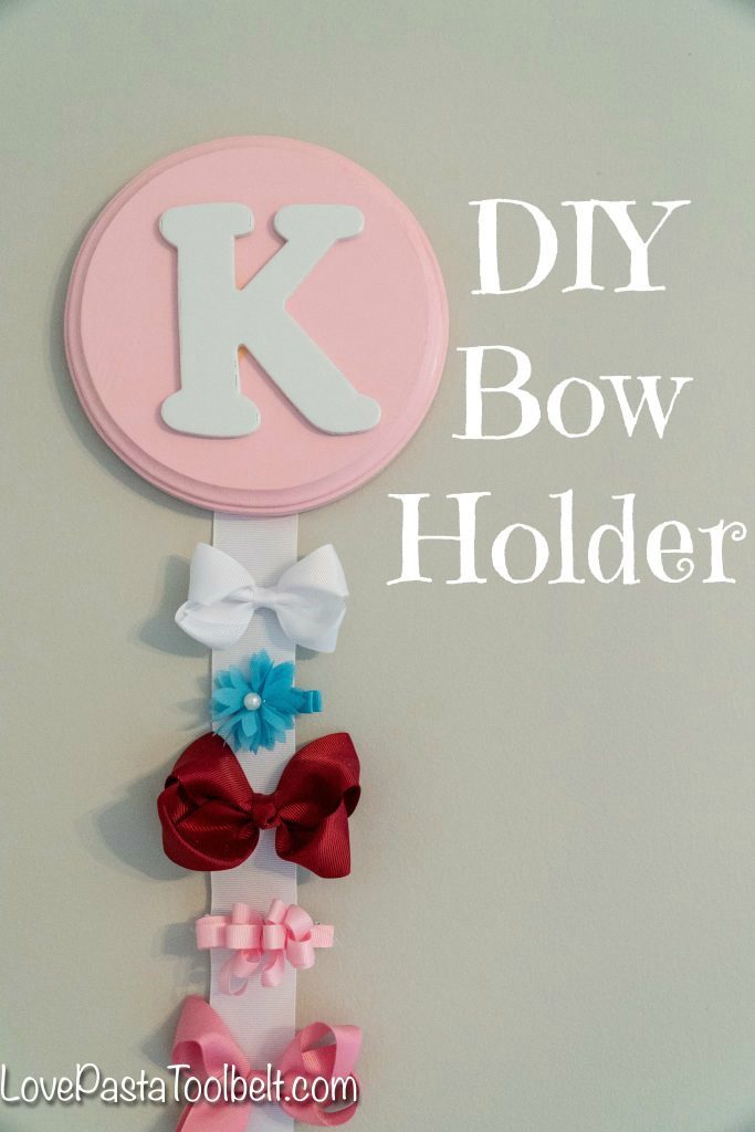 Create a cute and functional way to display your little girl's bows with this DIY Bow Holder from Love, Pasta and a Tool Belt