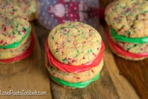 Thick and chewy cookies sandwiched together with delicious buttercream icing, these Funfetti Cookie Sandwiches will be a hit with the family any time of the year!