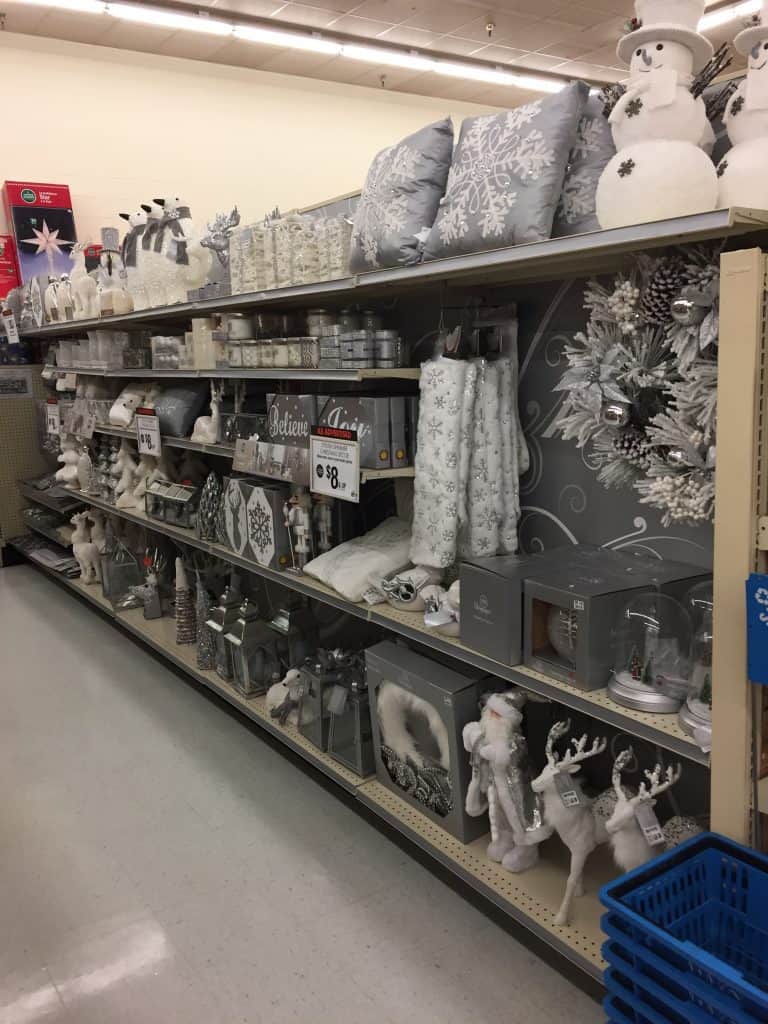 Starting Christmas decorating? Get inspired with this Silver and White Christmas Mantle!