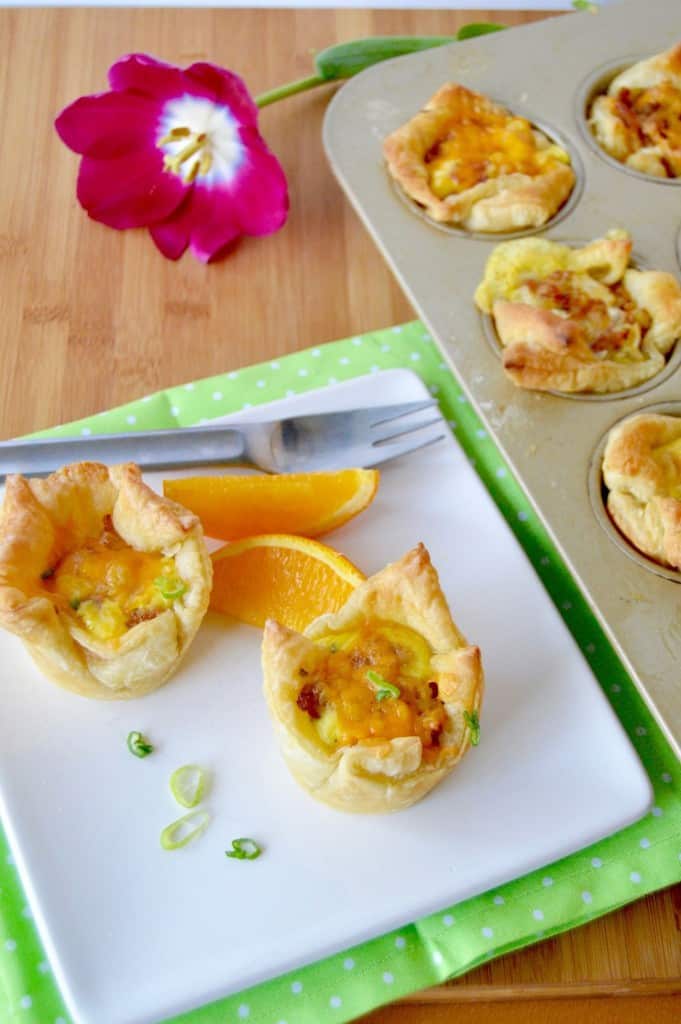 Loaded Puff Pastry Breakfast Cups are full of everything you love: bacon, hash browns, eggs, sausage and cheese! All individual portions for easy eating! Great for a party or a brunch! Click thru for the recipe or Repin to save for later!