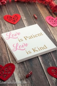 Make some cute decor for Valentine's or year round with this "Love is" Silhouette Canvas Art!- Love, Pasta and a Tool Belt | DIY | Silhouette | Free Silhouette File | Craft Ideas | Canvas |