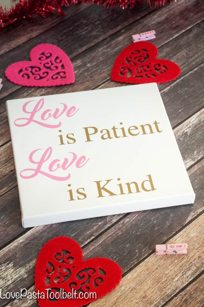 Make some cute decor for Valentine's or year round with this "Love is" Silhouette Canvas Art!- Love, Pasta and a Tool Belt | DIY | Silhouette | Free Silhouette File | Craft Ideas | Canvas |