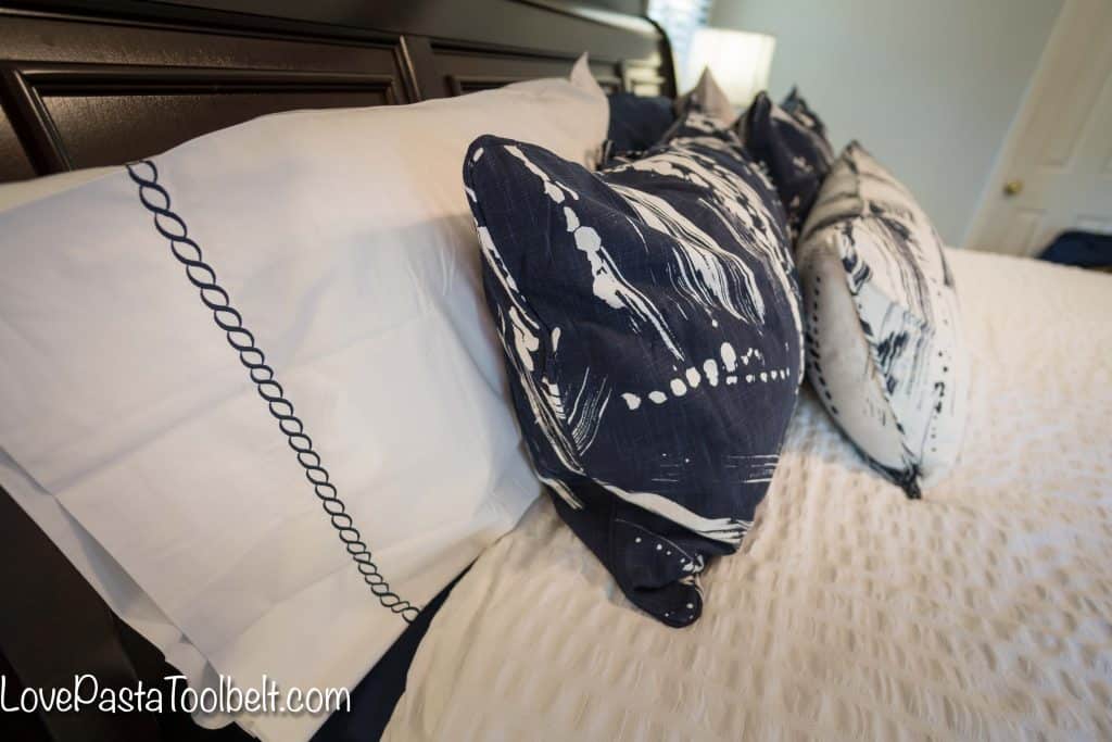 Find some inspiration for a Navy and Gray Master Bedroom for a luxurious and cozy room. #ad #AnnieSelkeStyle #IC