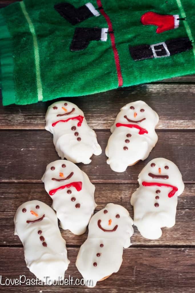 Make a fun holiday treat with these Nutter Butter Snowmen!- Love, Pasta and a Tool Belt #NuttyForTheHolidays #ad