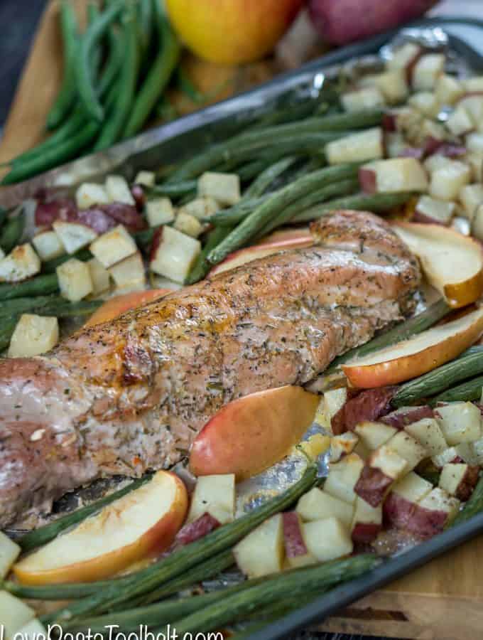 Have dinner ready in a flash with this delicious 30 Minute One Pan Roasted Garlic and Herb Pork Tenderloin. It's perfect for busy weeknights when you don't have time to spend cooking but still want a delicious meal for the family! #RealFlavorRealFast #ad