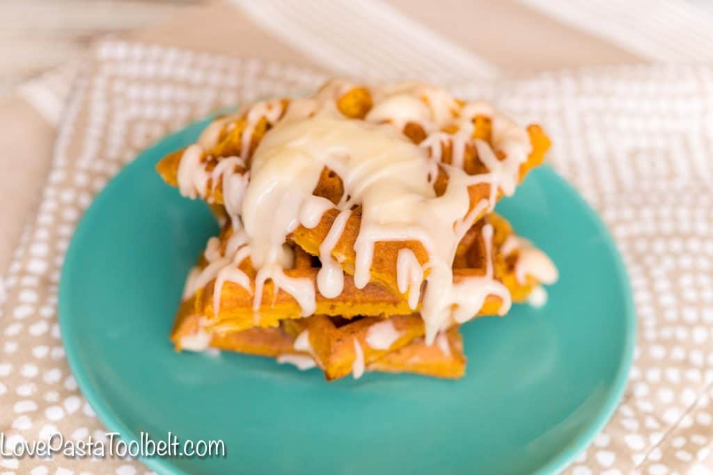 Add some fall to your breakfast with these Pumpkin Pie Waffles which are made complete with a delicious cream cheese glaze.