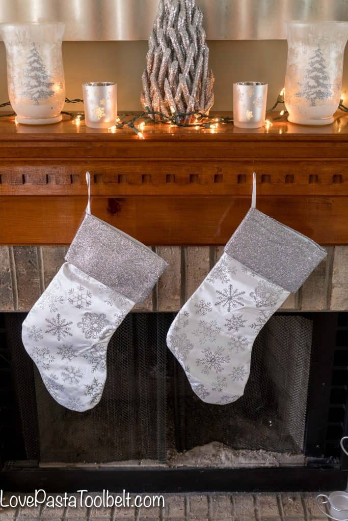 Get started on your Christmas decorating with this Silver and White Christmas Mantle Inspiration 