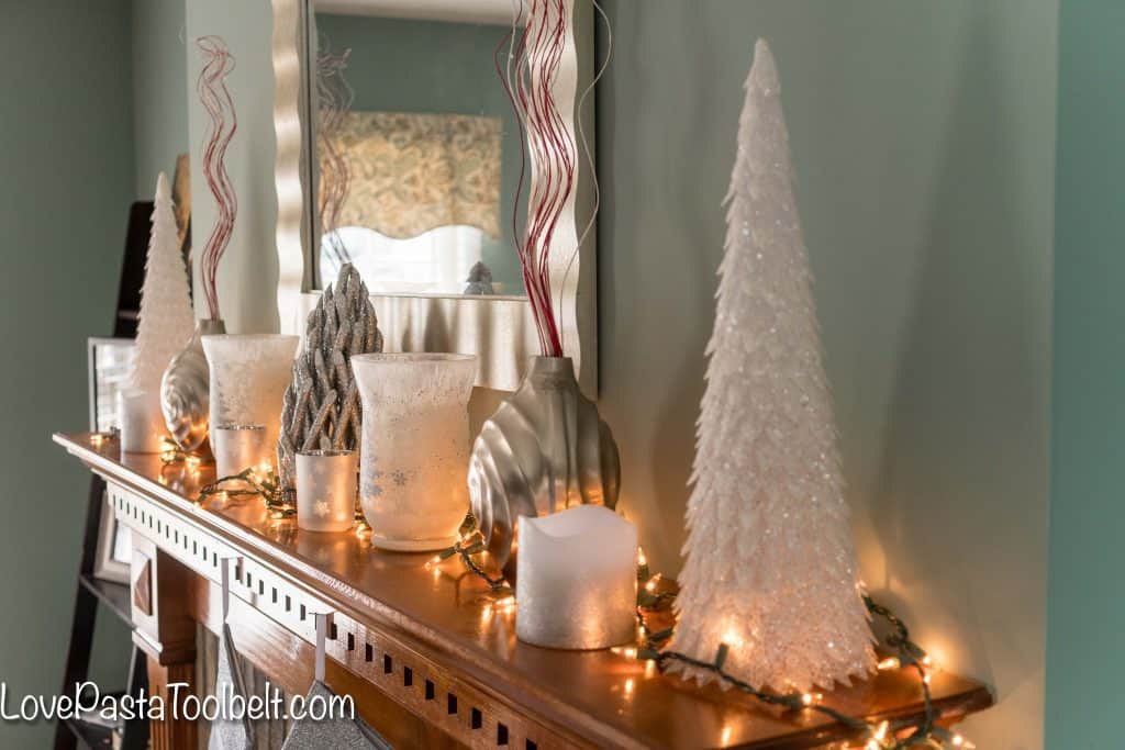 Get started on your Christmas decorating with this Silver and White Christmas Mantle Inspiration 