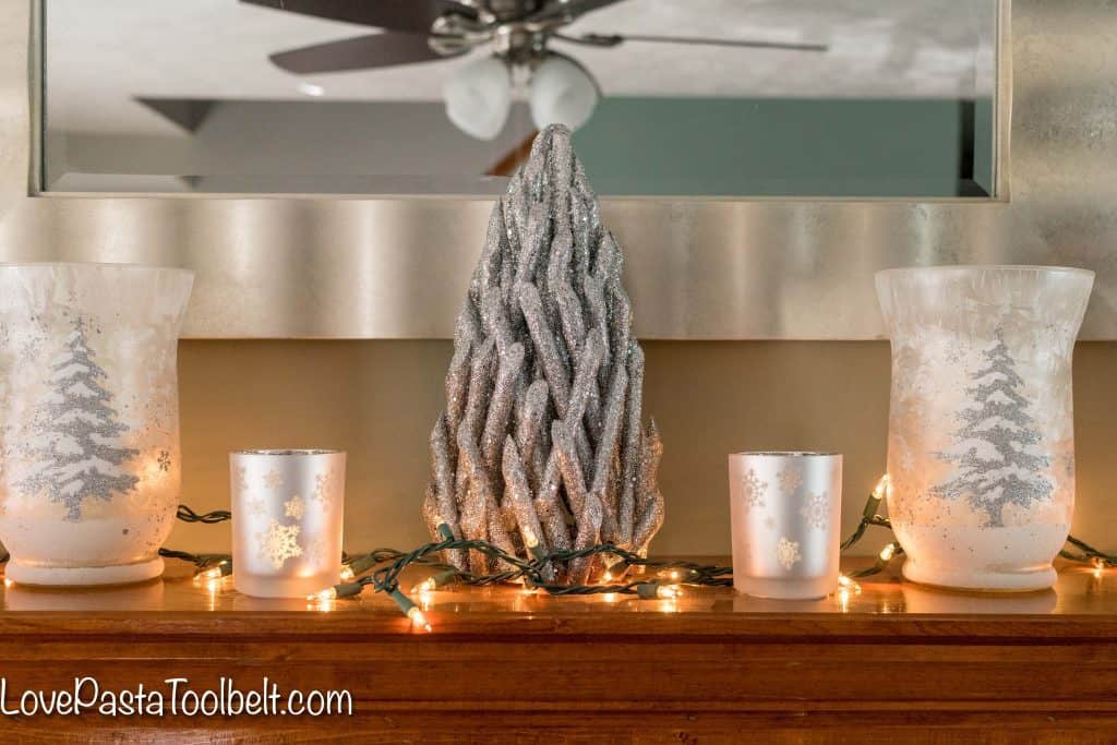 Get started on your Christmas decorating with this Silver and White Christmas Mantle Inspiration 